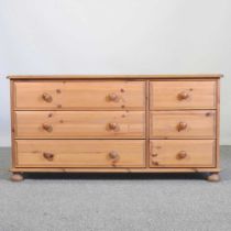 A modern pine chest, containing six drawers 124w x 42d x 62h cm
