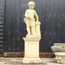 A cast stone garden statue figure of a cherub, on a pedestal base 48w x 48d x 170h cm