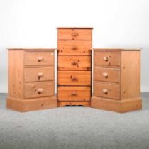 A pair of pine bedside chests, together with a pine narrow chest, 90cm high (3) 42w x 36d x 90h cm