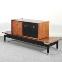 A 1960's G plan cabinet, together with a similar coffee table (2)
