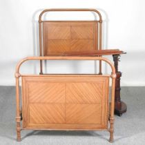 An early 20th century scumbled metal bedstead, 101cm wide, together with a Victorian patent mahogany