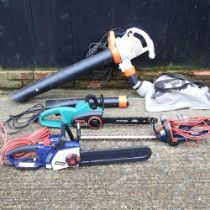 A Stihl SHE71 electric garden blower/vacuum, together with a Bosch electric chain saw, another and