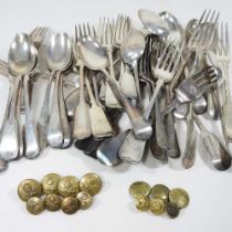 A collection of silver plated cutlery, together with military buttons