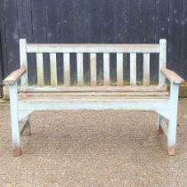 A painted wooden garden bench, 129cm wide