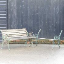 A cast iron garden bench, 127cm wide, with wooden slats, together with a bench frame (2)