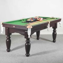 A modern six foot BCE 2000 series snooker table, with a slate bed, to include snooker cues and balls