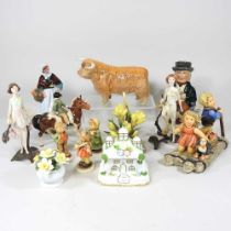 A Royal Doulton figure Country Lass, HN1991, together with a collection of Goebel figures, a Beswick