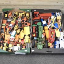 A large collection of die cast toy vehicles, mainly farming related