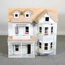 A grey painted doll's house 80w x 54d x 80h cm