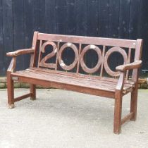 A slatted wooden Millenium 2000 garden bench, 162cm