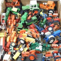 A large collection of model toy tractors, to include Dinky Massey Harris and Leyland, Ertl and