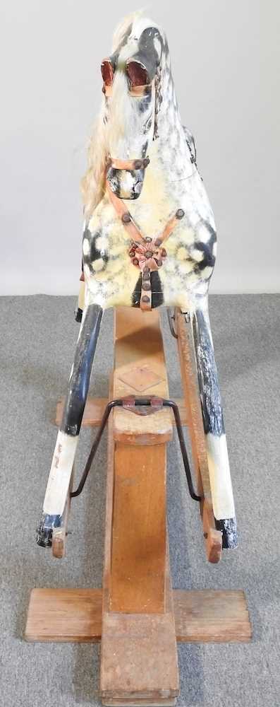 An early to mid 20th century painted wooden dappled grey rocking horse, on a wooden trestle base - Image 6 of 7