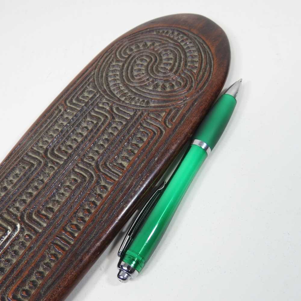 A Maori hardwood short paddle, carved in low relief with geometric designs, 39cm long - Image 3 of 4