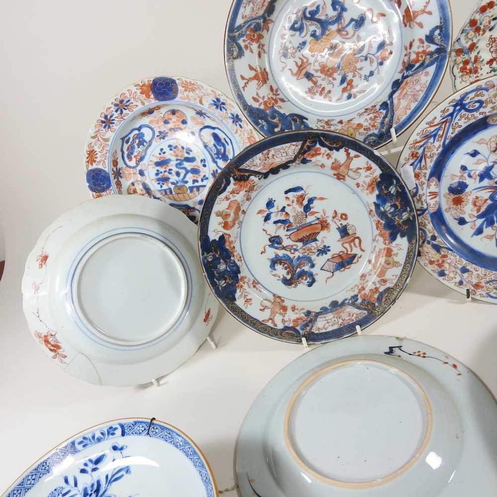 A collection of twelve 18th century Imari porcelain plates, each decorated with still life subjects, - Image 12 of 12