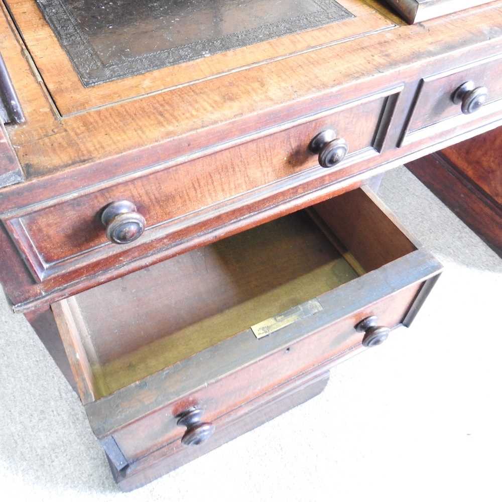 A large Victorian mahogany cylinder desk, the fitted interior with a sloping writing surface, on a - Image 4 of 7
