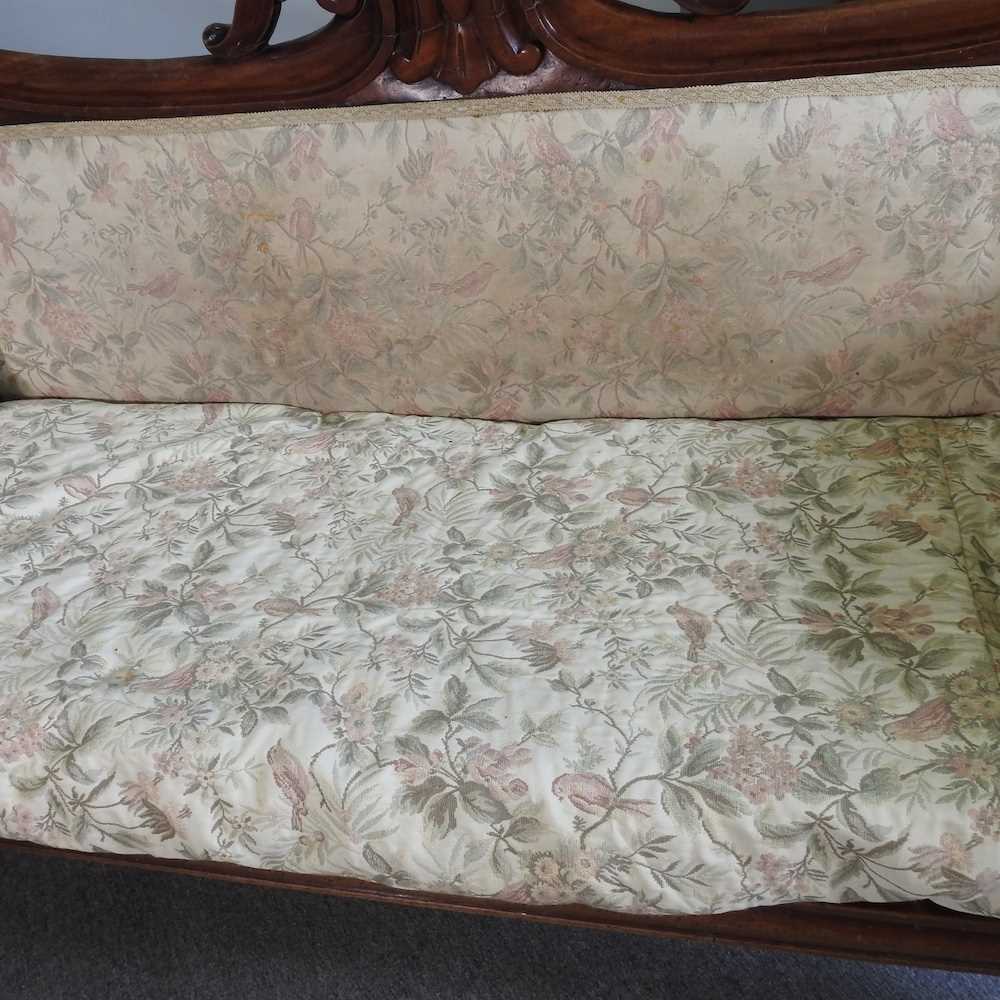 A 19th century carved mahogany double ended couch, upholstered in cream, on turned legs 210w x 56d x - Image 6 of 11