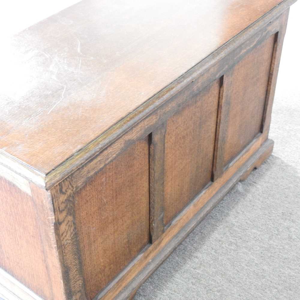 A 1920' s oak blanket box, with a hinged lid and linenfold front 90w x 44d x 54h cm - Image 6 of 6