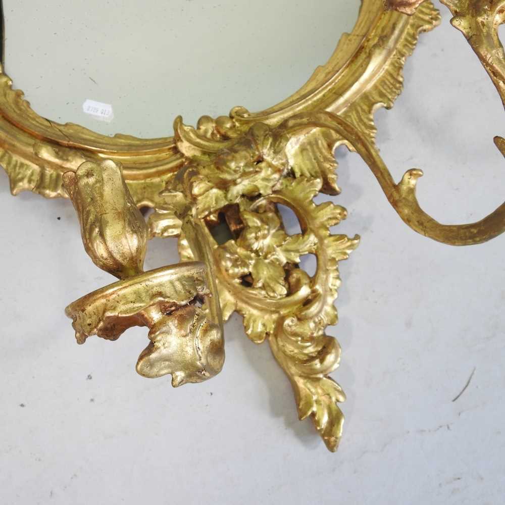 A Rococo style gilt framed girandole, 20th century, of cartouche shape, with a scrolled surround and - Image 3 of 5