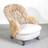 A Victorian button back upholstered armchair