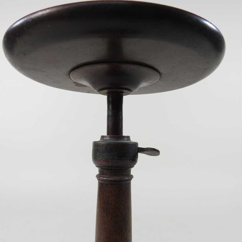 A 19th century turned mahogany stand, with an adjustable dished top, on a weighted base, 15cm - Image 4 of 5