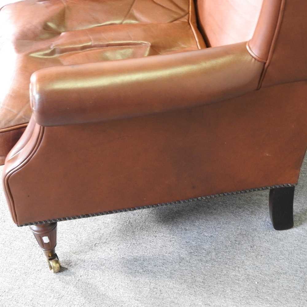 A Laura Ashley brown leather upholstered wing armchair, on turned legs - Image 4 of 7