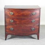 A 19th century mahogany bow front chest, containing three long drawers, on swept bracket feet 93w