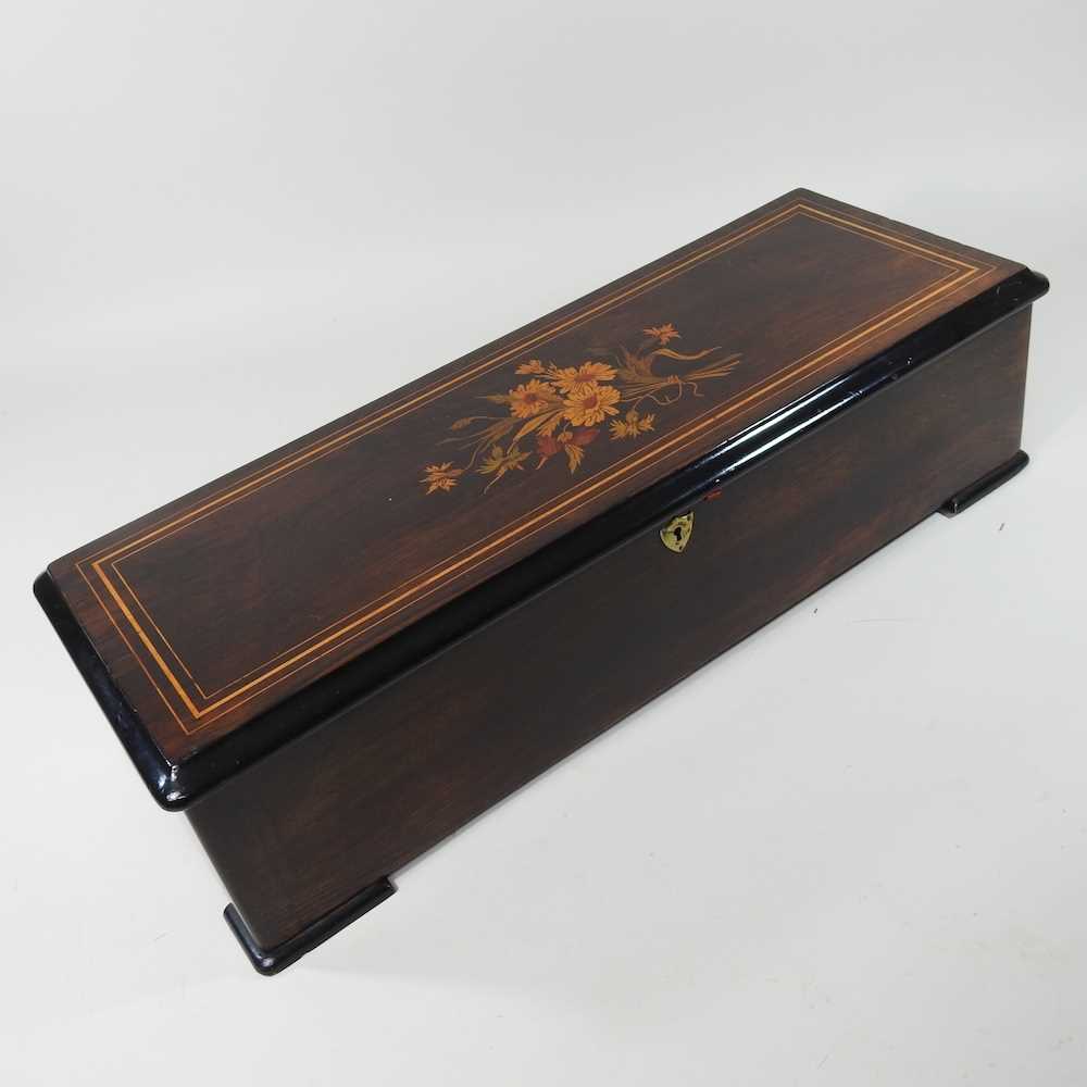 A 19th century Swiss musical box, playing twelve airs, in an inlaid rosewood case 62w x 24d x 16h - Image 9 of 11