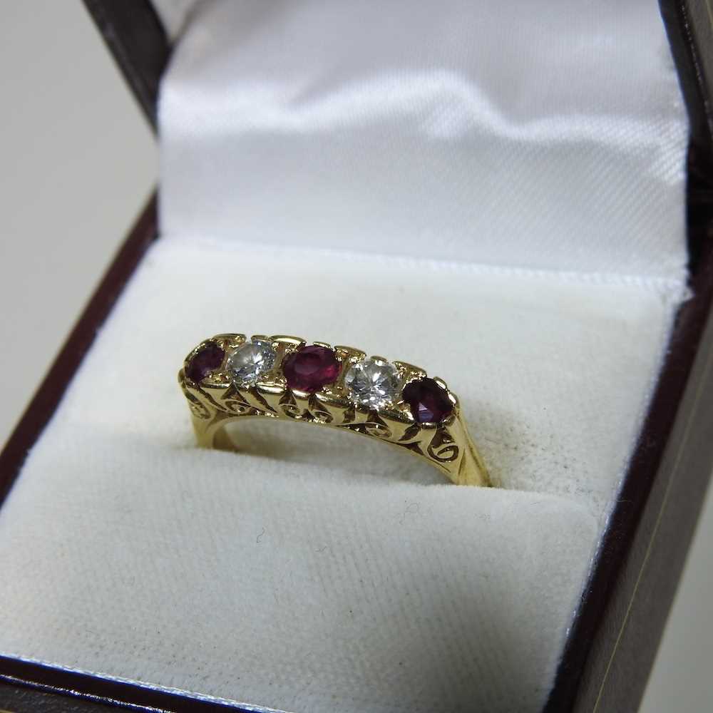 An 18 carat gold ruby and diamond ring, set with five alternating stones, 2.9g, size M, boxed - Image 2 of 7