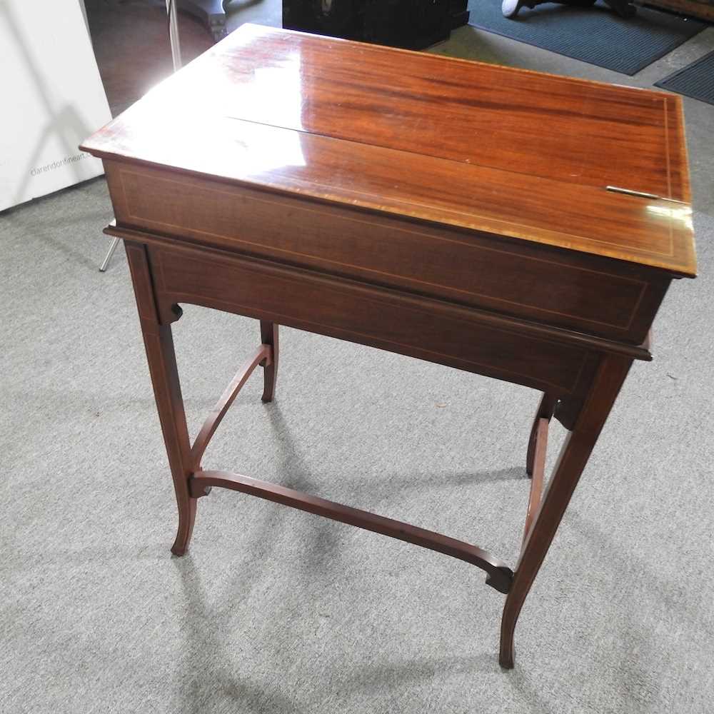 An early 20th century mahogany military style writing desk, with a dual hinged top, revealing a - Image 9 of 9