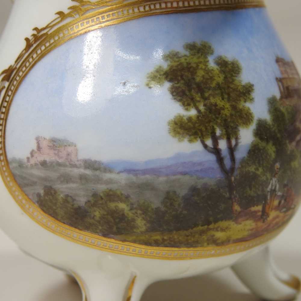 A 19th century Meissen style porcelain cream jug, reserved with a Veduta landscape, within a gilt - Image 4 of 6