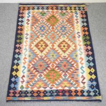 A kilim rug, with all over coloured diamonds, 155 x 105cm