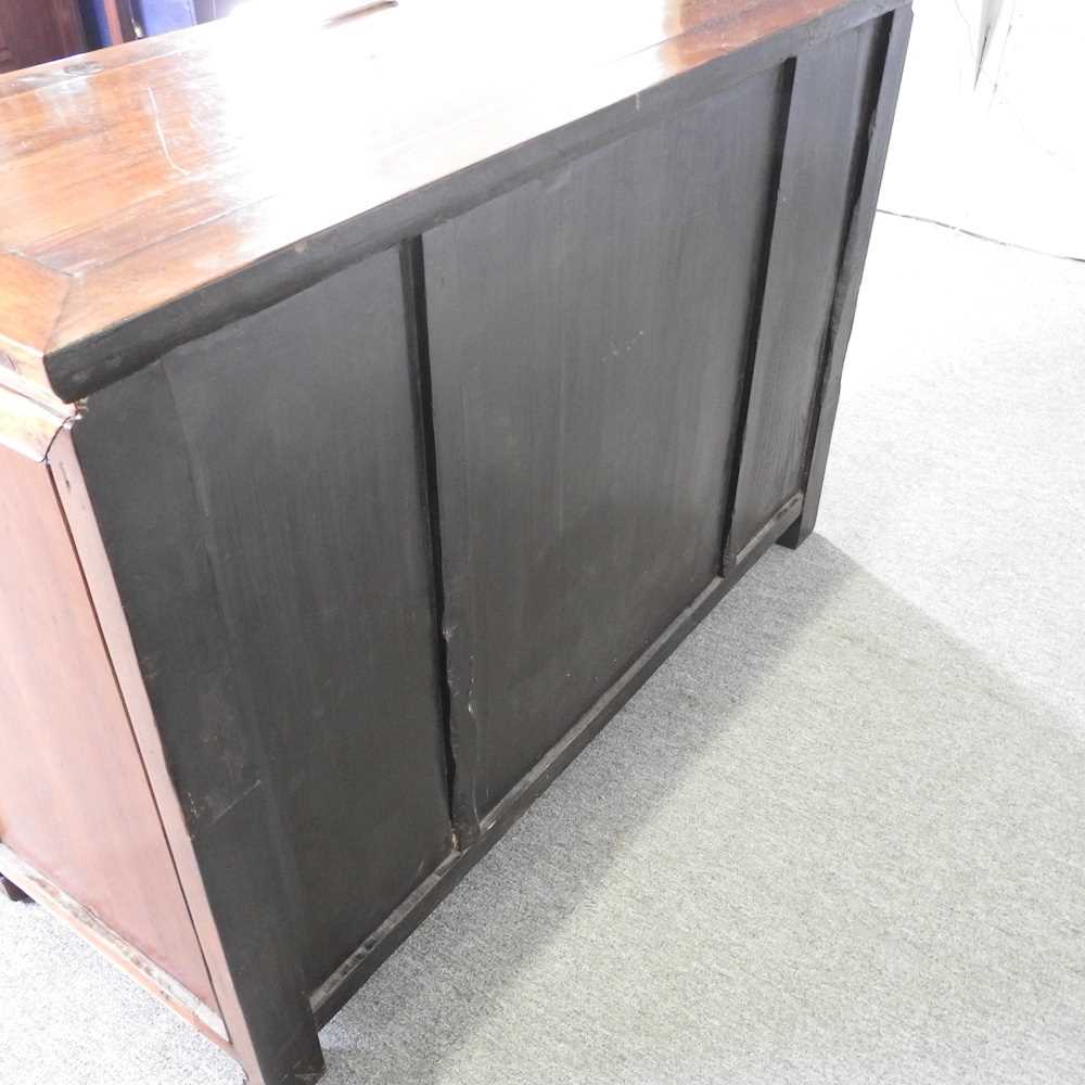 A modern Chinese hardwood sideboard, containing short drawers and cupboards 126w x 50d x 88h cm - Image 4 of 7