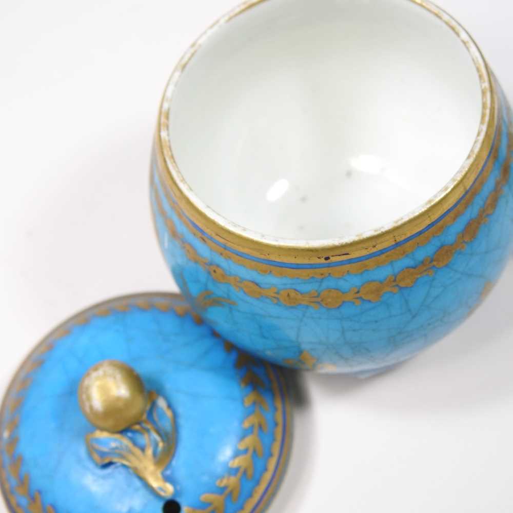 A set of eight 19th century Sevres porcelain custard cups and covers, with gilt decoration on a blue - Image 7 of 15