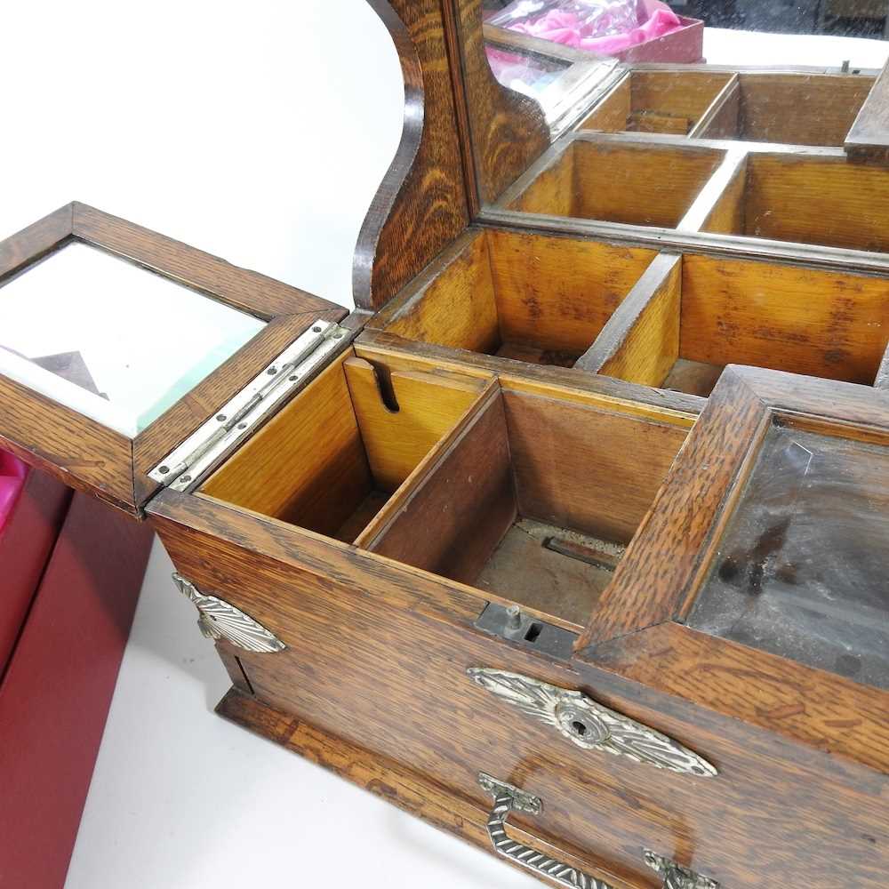 An early 20th century oak three bottle tantalus, with a drawer below, 41cm wide, together with a - Image 5 of 9