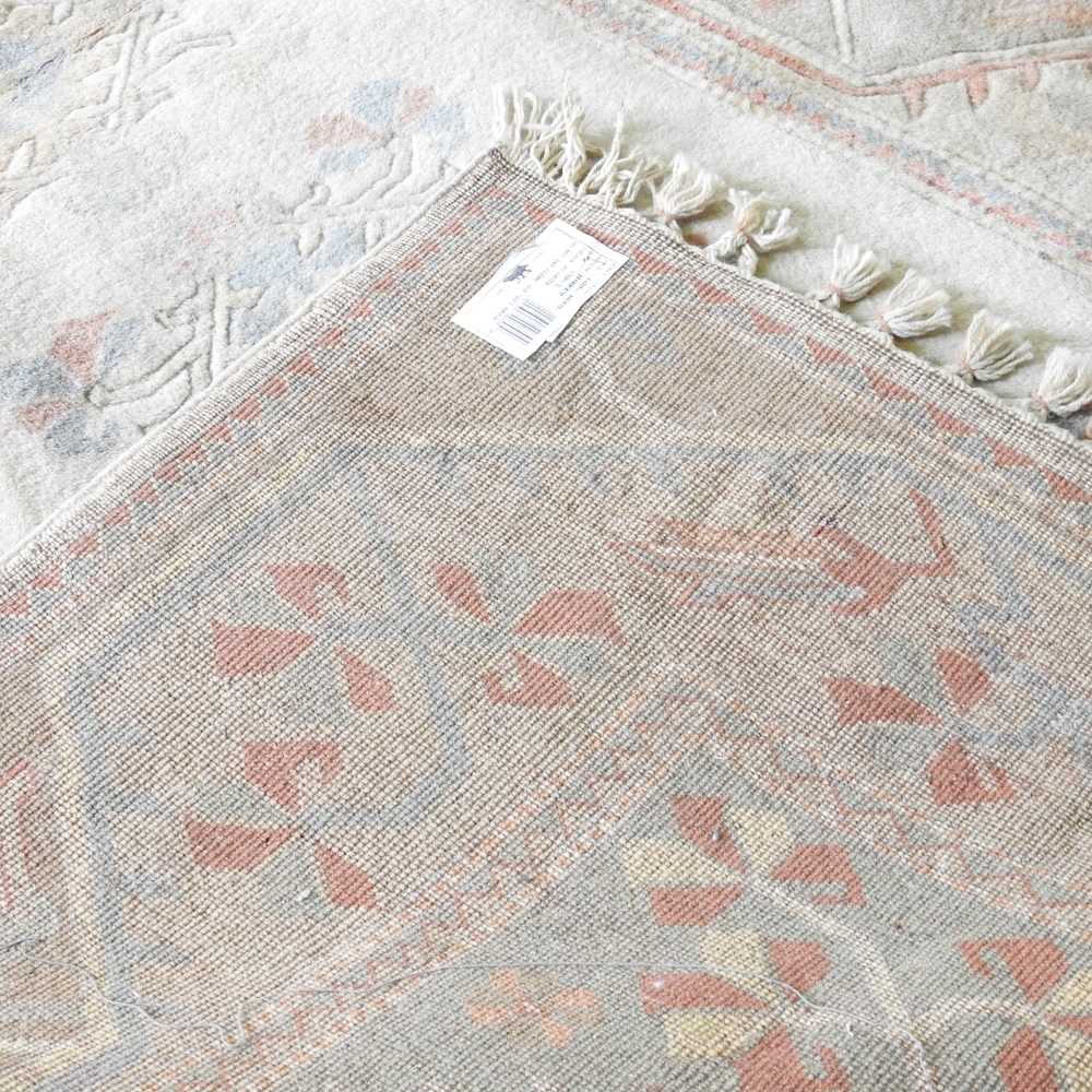 A Turkish woollen carpet, with all over designs on a cream ground, 280 x 190cm - Image 2 of 5