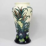 A Moorcroft pottery vase, of shouldered form, decorated in the Lamia pattern, with a dragonfly and
