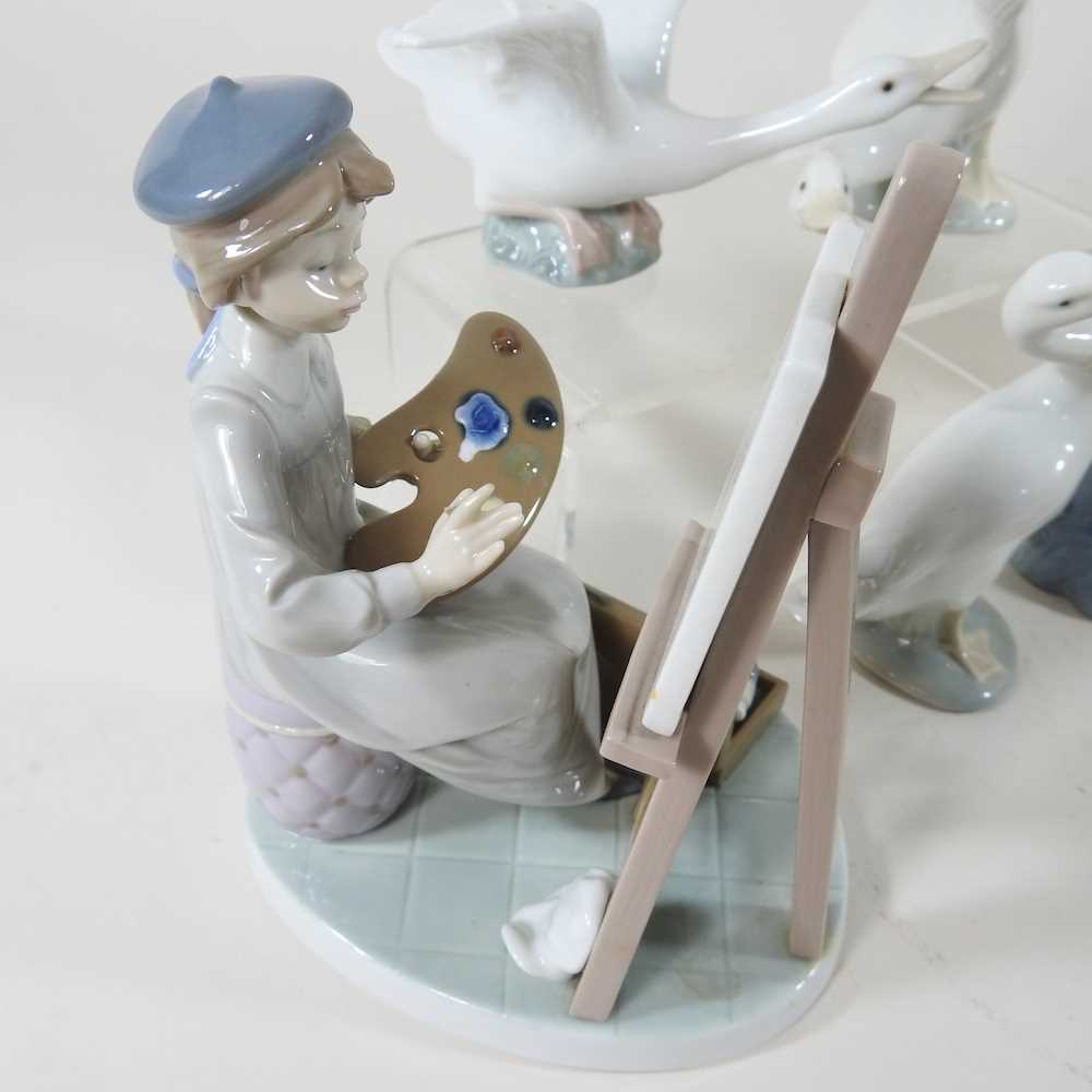 A Lladro figure of an artist, 18cm high, together with a collection of Nao and Lladro figures of - Image 3 of 7