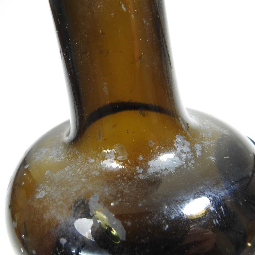 An 18th century English brown glass sealed wine bottle, inscribed All Souls Coll:C:R, 26cm high - Image 10 of 15