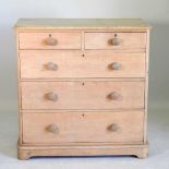 A Victorian stripped pine chest of two short over three long drawers 106w x 51d x 107h cm Overall