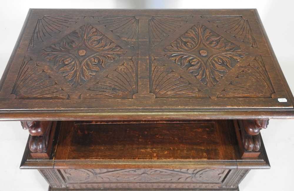 An early 20th century carved oak monk's bench, with griffin supports 92w x 50d x 82h cm - Image 5 of 10