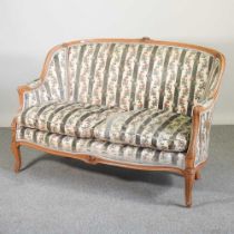 An early 20th century French show frame sofa, with striped upholstery 135w x 79d x 93h cm