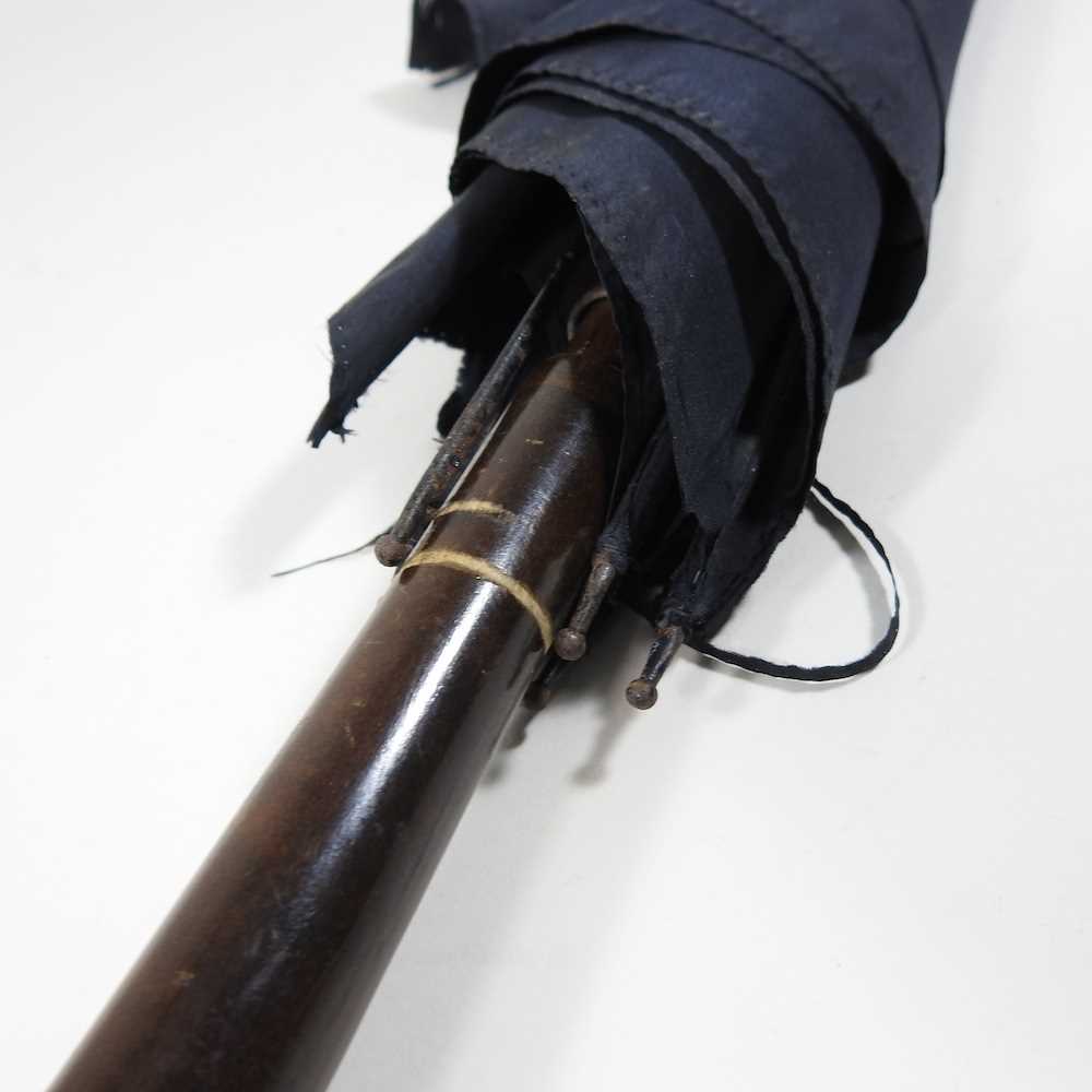 An early 20th century Japanese parasol, the handle carved to simulate a leather strap, decorated - Image 8 of 15