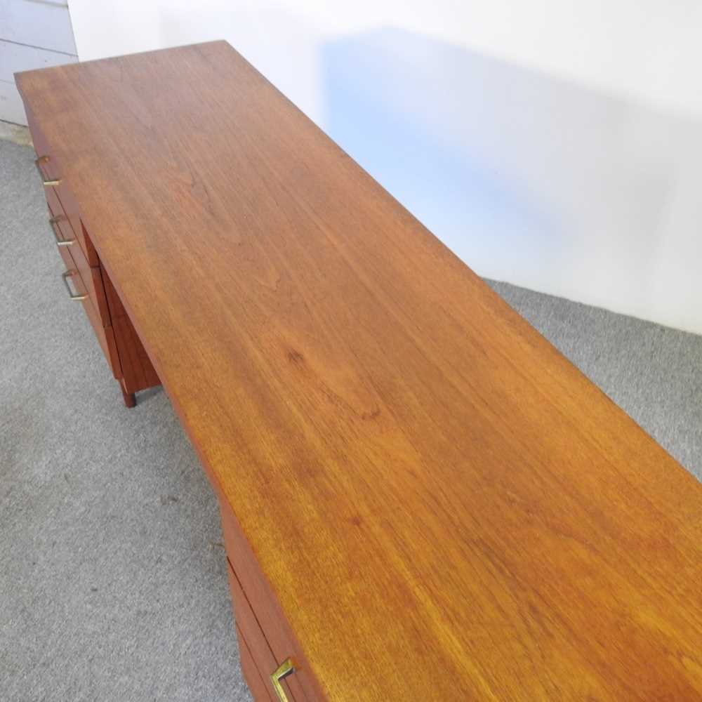 A 1970's teak desk, containing six short drawers 168w x 44d x 70h cm - Image 3 of 6