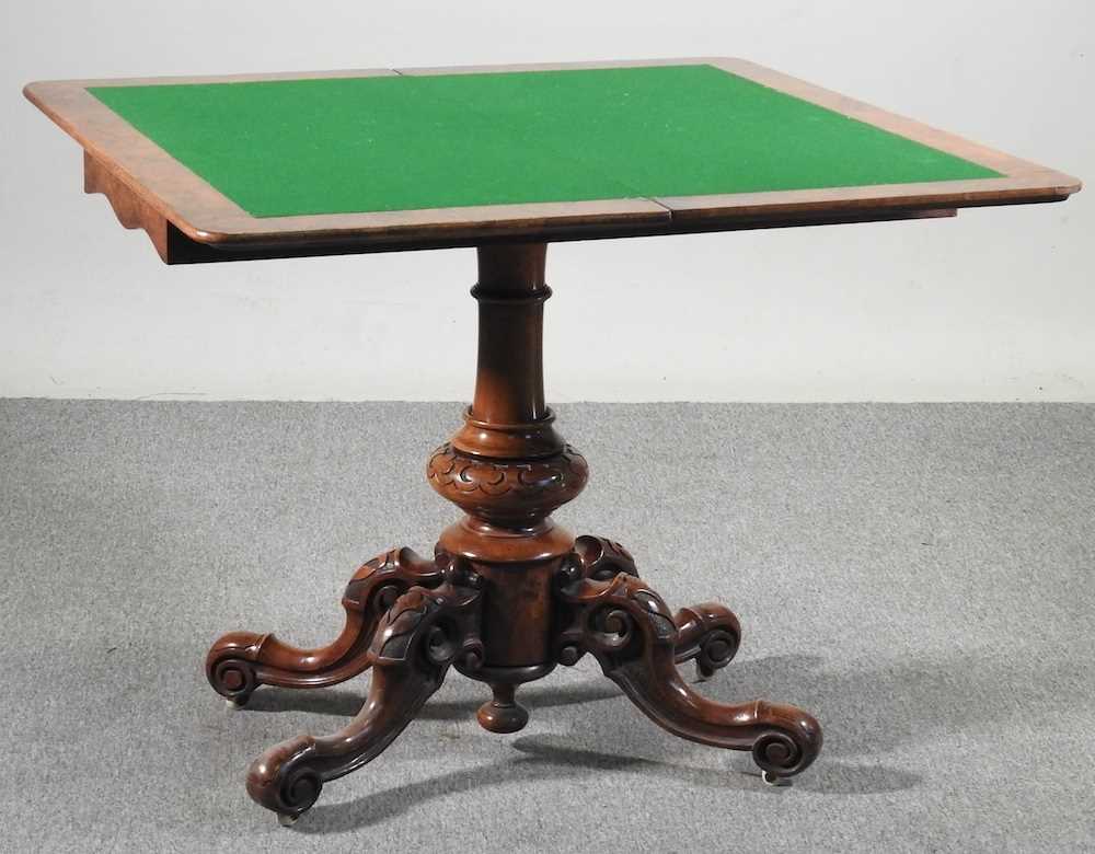 A Victorian burr walnut folding card table, the hinged rectangular top, on a carved column and - Image 2 of 4