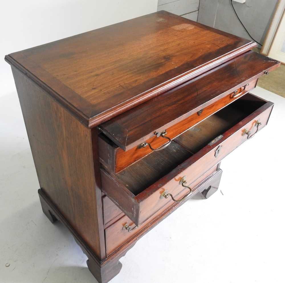 A 19th century mahogany and crossbanded bachelor's chest, with a brushing slide, on bracket feet 72w - Image 3 of 5