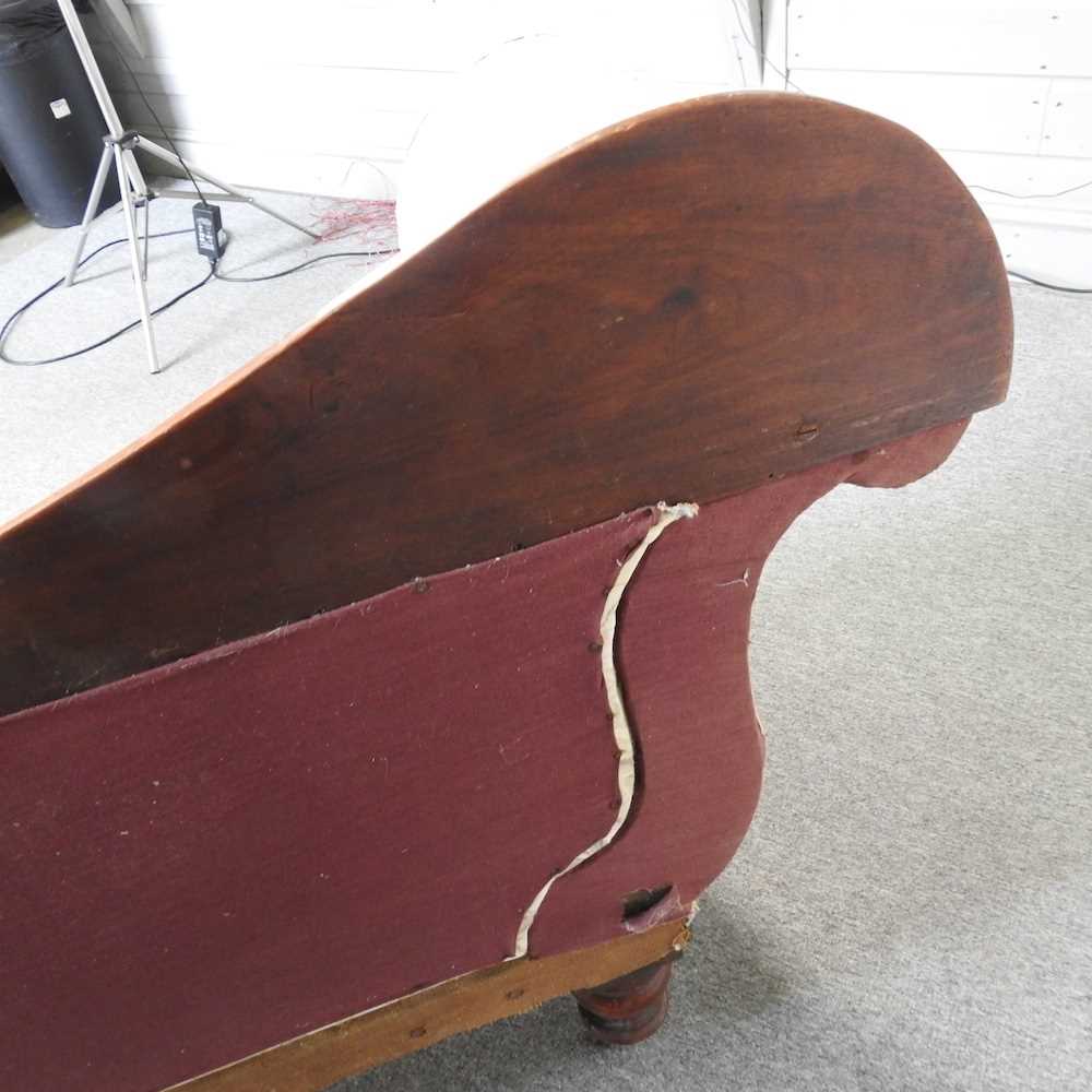 A 19th century carved mahogany double ended couch, upholstered in cream, on turned legs 210w x 56d x - Image 10 of 11