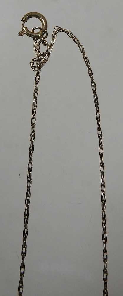A 9 carat gold gem set pendant necklace, on a fine chain, 48cm long, 1.9g, cased - Image 3 of 6