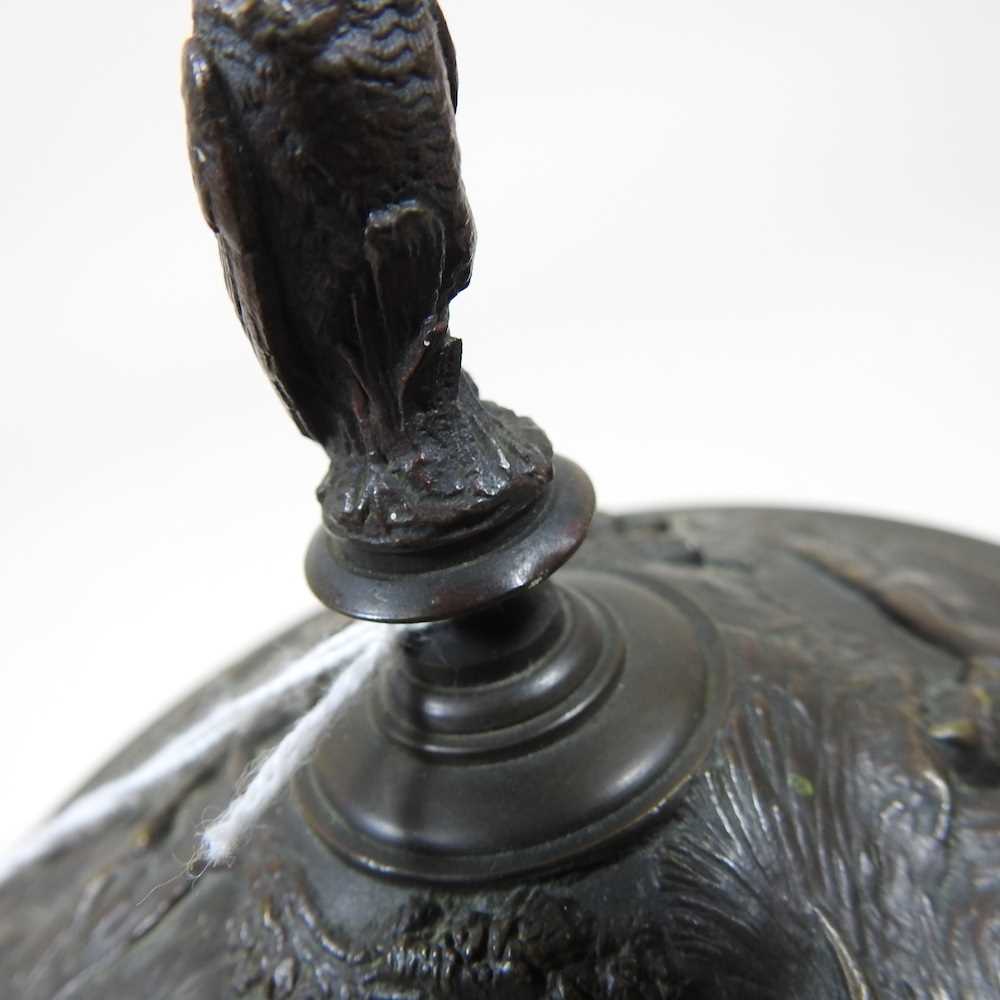 A 19th century cast bronze cup and cover, of pedestal form, decorated in relief with game, flanked - Image 12 of 12