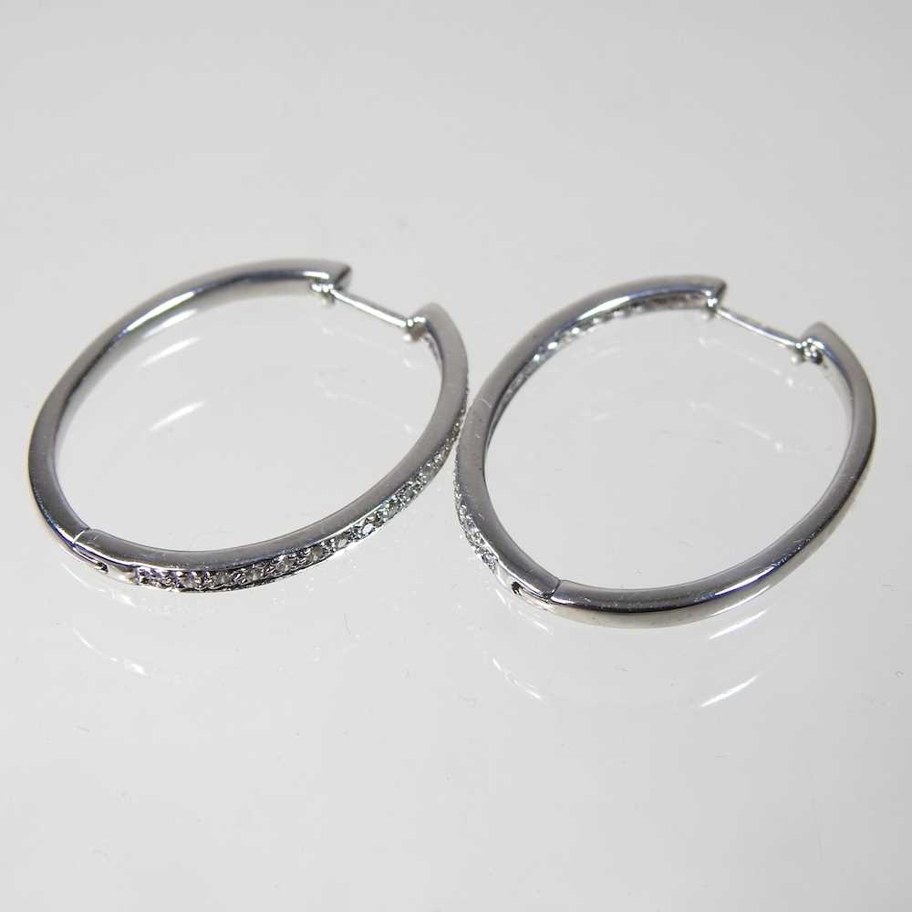 A pair of 9 carat white gold and diamond set hoop earrings, 4g, 3cm high, with a Gems TV
