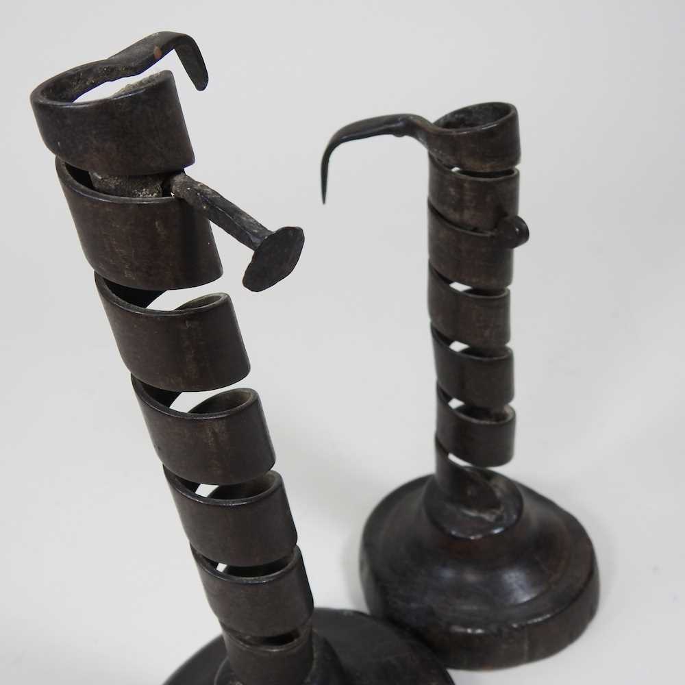 An 18th century French iron Rat de Caves spirally turned candlestick, on a wooden base, 21cm high, - Image 3 of 7